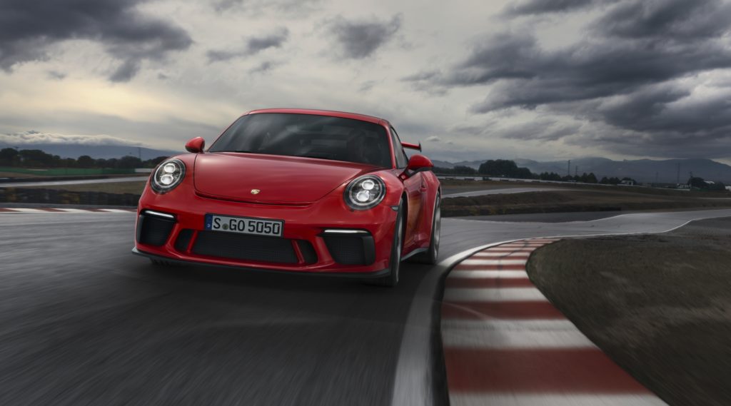 2018 Porsche 911 GT3 - Red Exterior - Front Side - Dynamic - Track