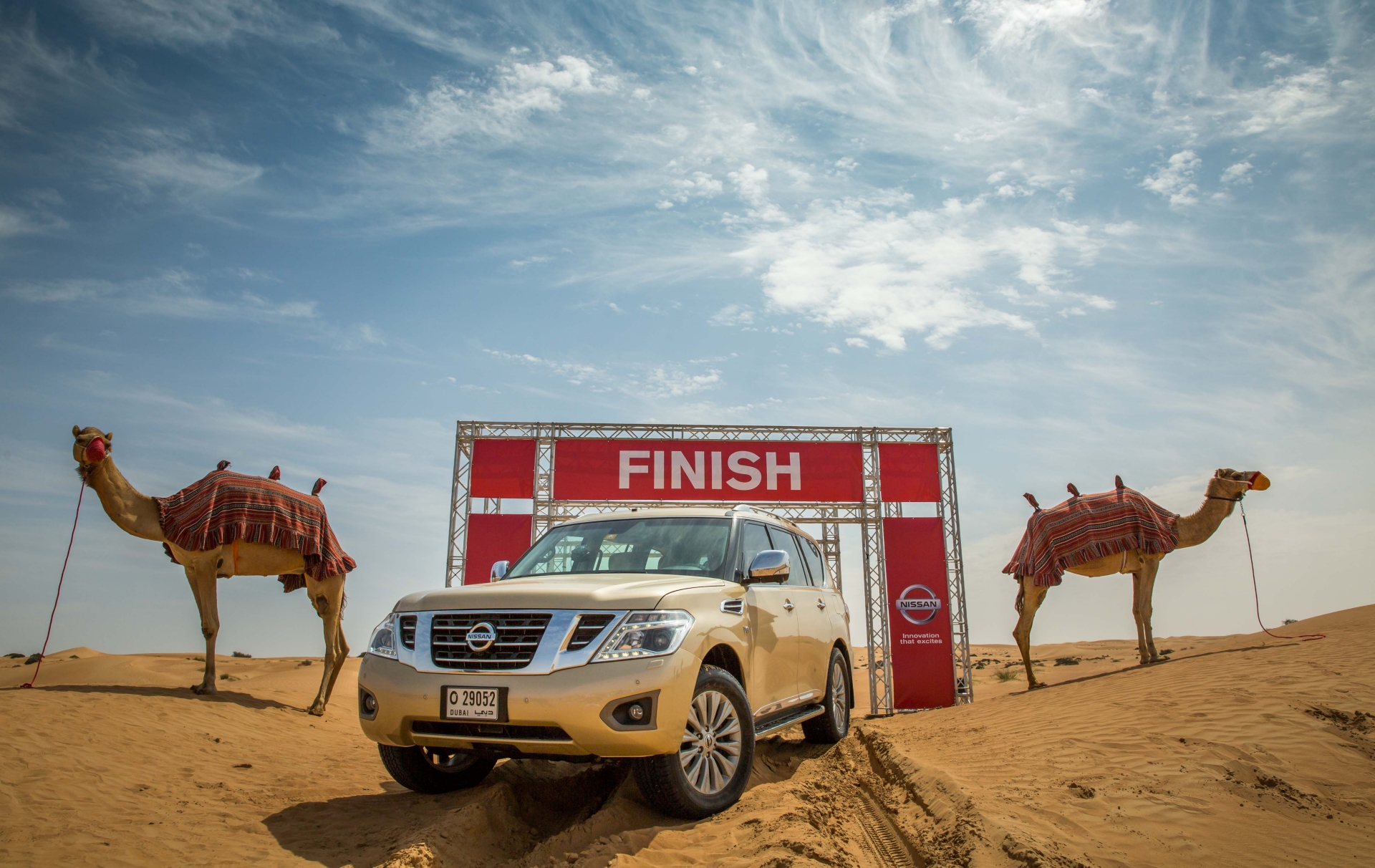 Nissan Introduces Desert Camel Power - the scientific measure of desert Performance - Nissan Patrol Y62 - Gold Exterior
