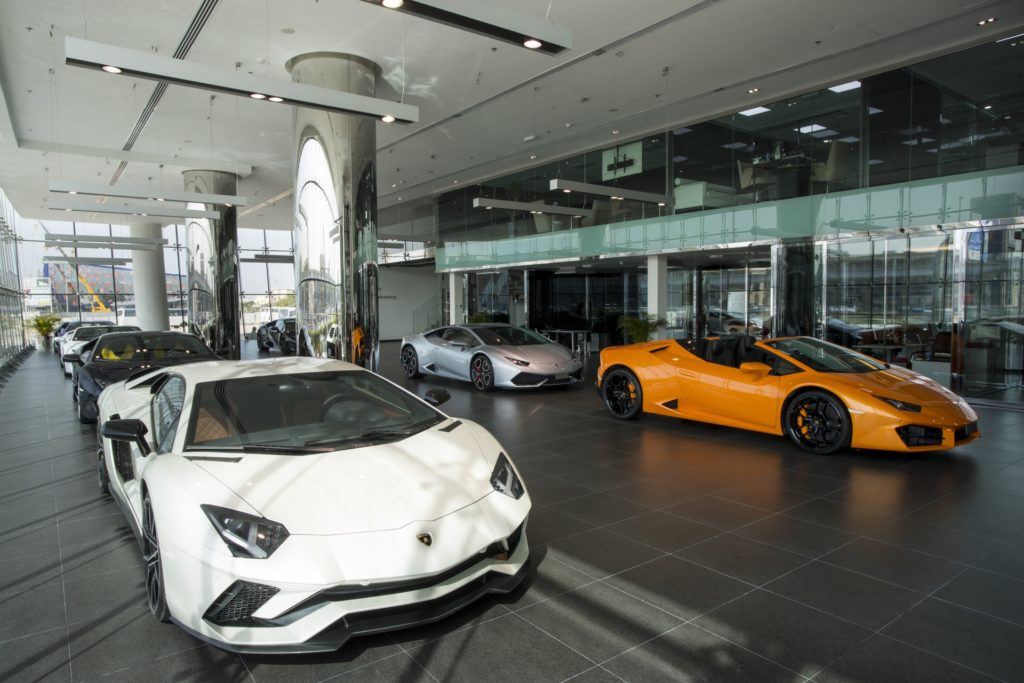 Largest Lamborghini Showroom Opens In Dubai - Interior - White Aventador S And Yellow Huracan Spyder