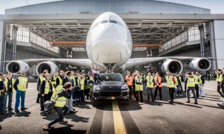 Porsche Cayenne S Diesel pulls one of Air France's 285 tonne A380 at Charles de Gaulle Airport in Paris - Both Vehicles & Crew