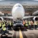 Porsche Cayenne S Diesel pulls one of Air France's 285 tonne A380 at Charles de Gaulle Airport in Paris - Both Vehicles & Crew