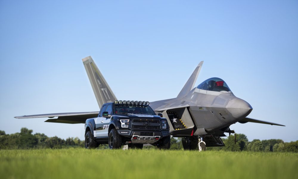 Ford F-150 Raptor F-22 Concept along side Lockheed Martin F-22 Raptor - Black Exterior - Front Side View - Zoomed out