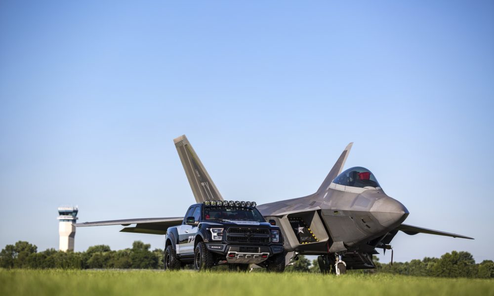 Ford F-150 Raptor F-22 Concept along side Lockheed Martin F-22 Raptor - Black Exterior - Front View - Zoomed Out
