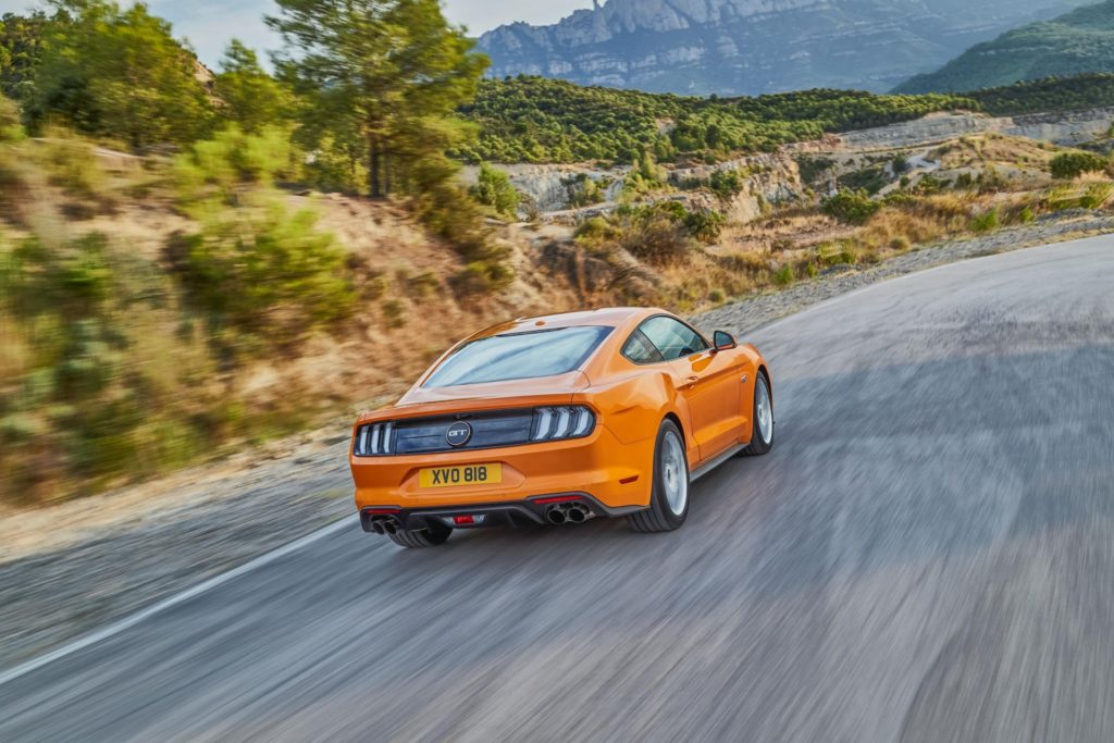2018 Ford Mustang GT Coupe - Orange Exterior - Rear Side View - Dynamic