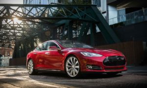Tesla Model S - Red Exterior - Front Side View - Static - Green Machine | A Closer Look At Electric Cars And Hybrid Vehicles