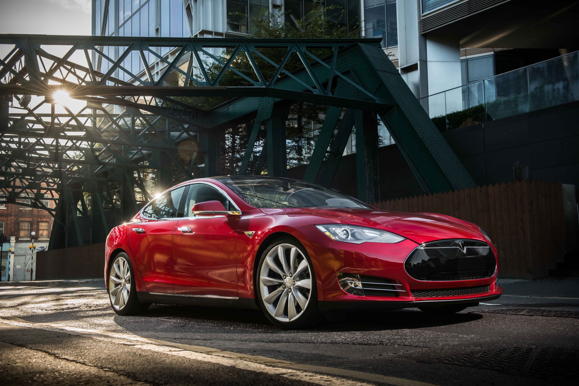 Tesla Model S - Red Exterior - Front Side View - Static - Green Machine | A Closer Look At Electric Cars And Hybrid Vehicles