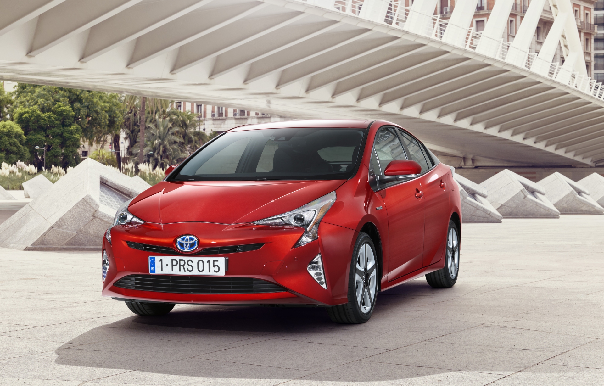 Toyota Prius - Red Exterior - Front Side View - Green Machine | A Closer Look At Electric Cars And Hybrid Vehicles