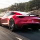 Tesla Roadster - Red Exterior - Rear Side View - Dynamic