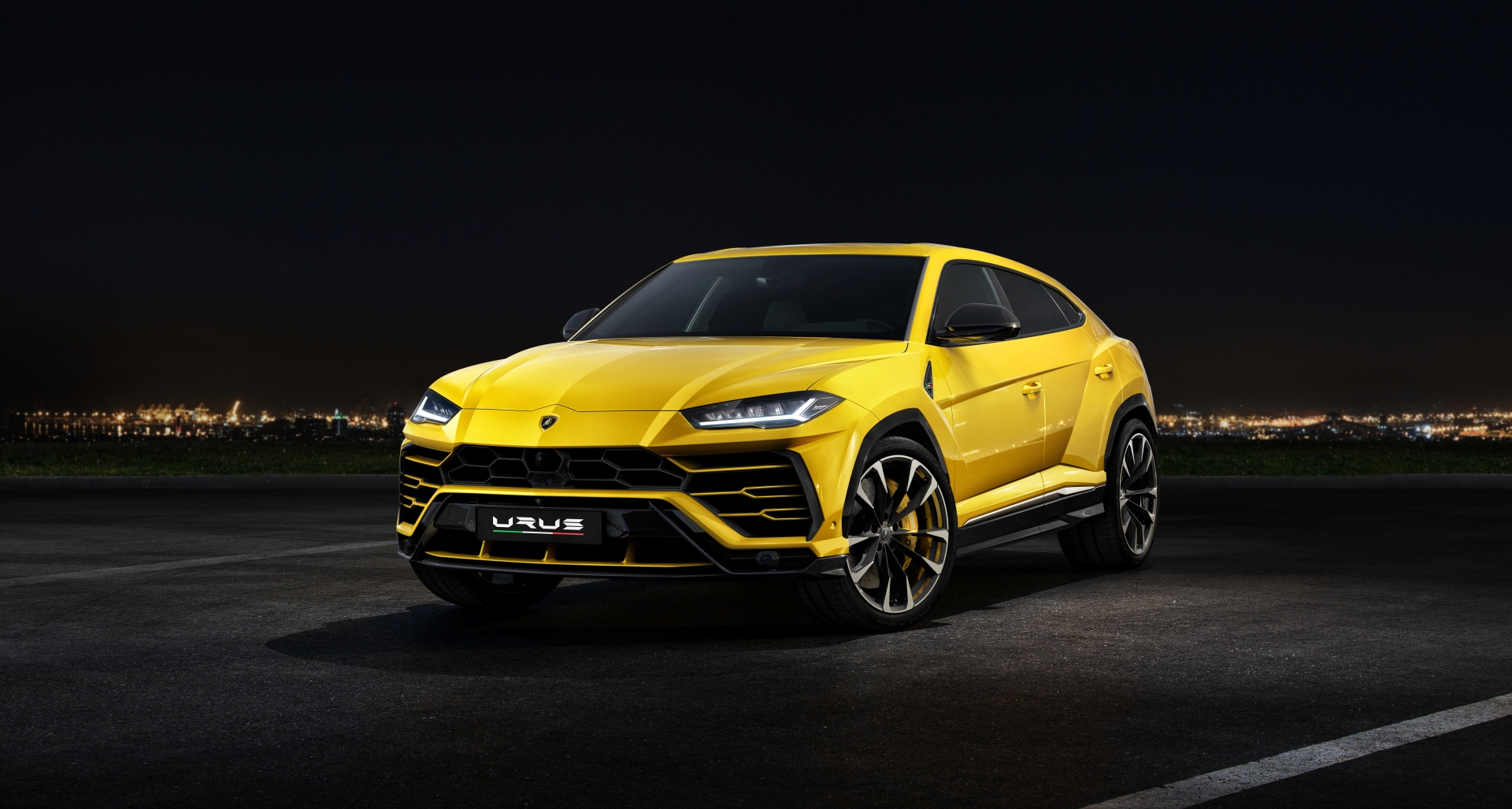 2018 Lamborghini Urus SUV - Yellow Exterior - Front Side View - Black Background